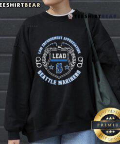 Official Seattle Mariners Law Enforcement Appreciation Day 2025 sweatshirt featuring team logo and commemorative design.