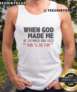 Alt Text: Premium tank top featuring 'When God Made Me He Grinned And Said This Will Be Fun' design for fun-loving individuals.