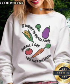 Wearing a cool sweatshirt from Remi's farm, featuring Remi Wolf's design, showcasing farm vibes and style.
