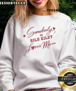 Pretty Rilo Kiley Somebody Loves Me heart sweatshirt in vibrant colors, perfect for fans of the band and cozy fashion.