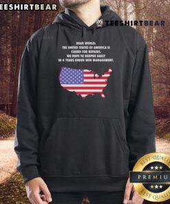 Top Dear World hoodie featuring 'The United States of America is Closed for Repairs' graphic design.