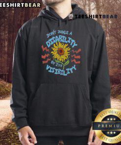 Sunflower hoodie with the phrase 'Don't Judge A Disability By Its Visibility' promoting disability awareness and acceptance.