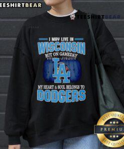 Cozy sweatshirt reading 'I May Live In Wisconsin But On Gameday My Heart Belongs To Dodgers' perfect for baseball fans.