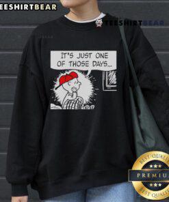 Cozy Snoopy Peanuts sweatshirt featuring 'Top It's Just One of Those Days' design, perfect for casual wear.