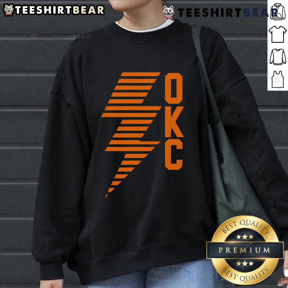 Alt Text: Top OKC Lightning Bolt Thunder Basketball Sweatshirt featuring bold graphic design and comfortable fit for fans.