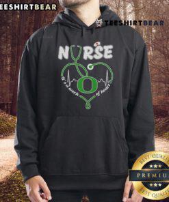 Alt Text: Cozy 'Top Oregon Ducks Nurse It's A Work Of Heart' hoodie featuring vibrant team colors and a heartwarming design.