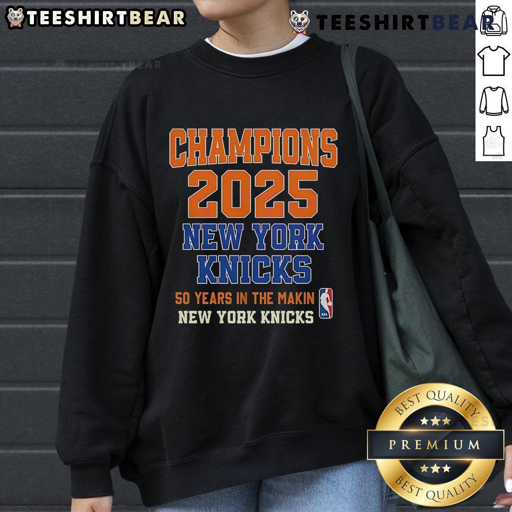 Alt Text: New York Knicks Champions sweatshirt celebrating years of playoffs success, perfect for fans at the game or home.