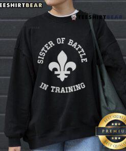 Alt Text: Top Sister of Battle in Training sweatshirt featuring bold graphics and a stylish design for gaming enthusiasts.