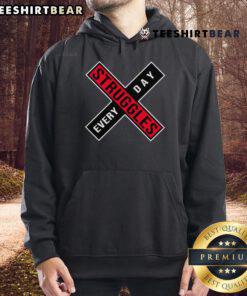 Cozy 'Top Struggles Every Day' hoodie displayed on a model, perfect for casual wear and showcasing relatable humor.