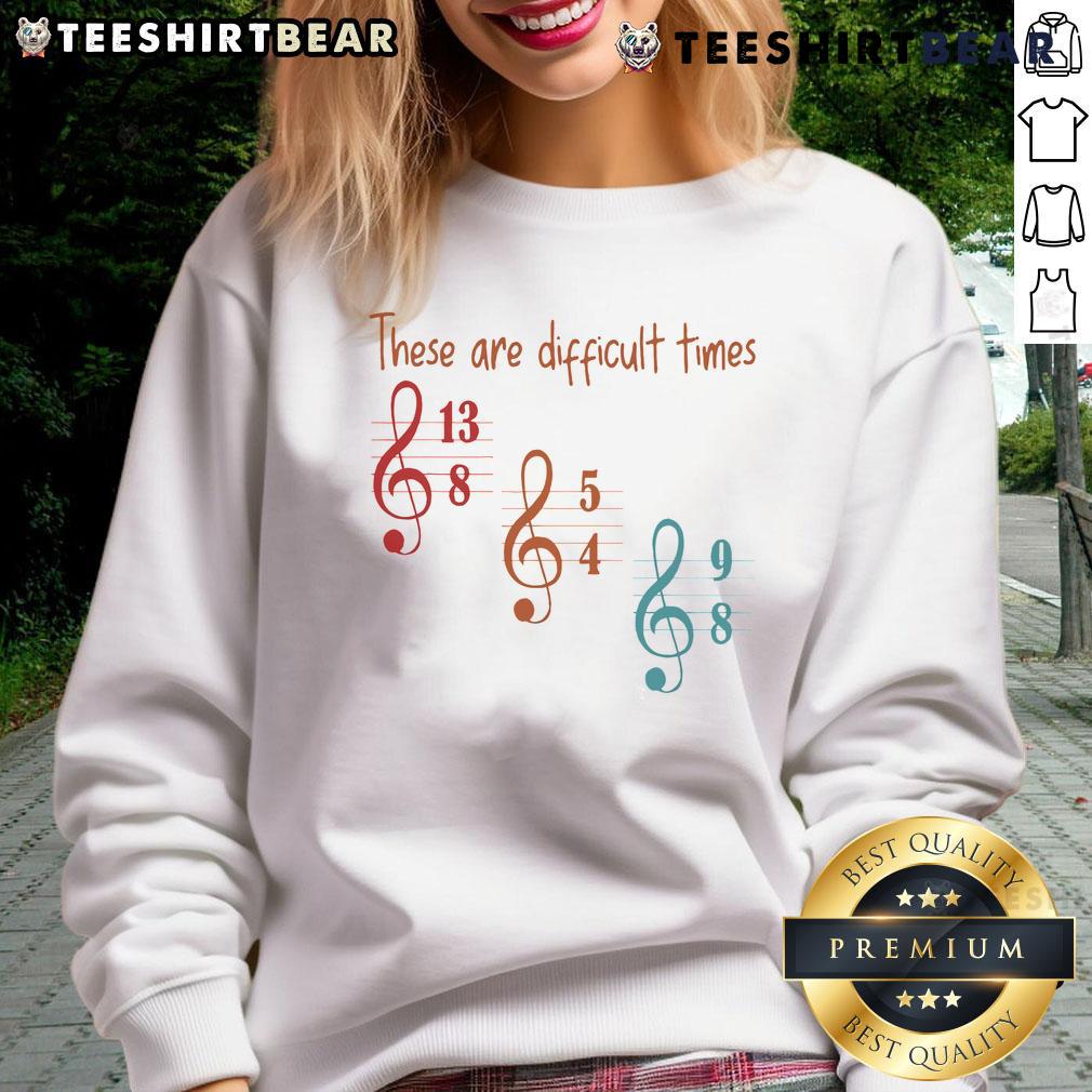 Cozy musician sweatshirt featuring 'Top These Are Difficult Times' slogan, perfect for casual wear and music lovers.