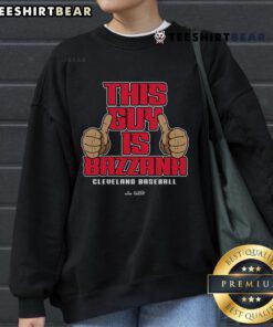 Travis Bazzana wearing a stylish MLBPA sweatshirt, showcasing his unique style and passion for baseball fashion.