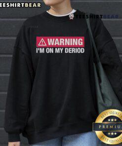 Top Warning I'm On My Period Sweatshirt in cozy style, perfect for comfortable wear during menstrual days.
