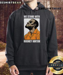 Top We Stand With Rodney Hinton hoodie featuring bold lettering, perfect for showing support and raising awareness.