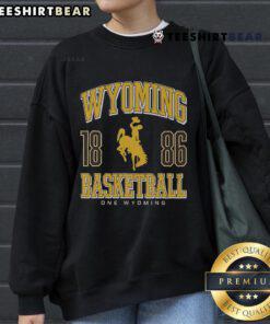 Cozy Top Wyoming Cowboys Basketball 1886 sweatshirt featuring team colors and logo, perfect for fans and casual wear.