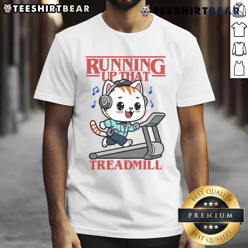 Cute cat running up a treadmill on a fun T-shirt design, perfect for cat lovers and fitness enthusiasts.