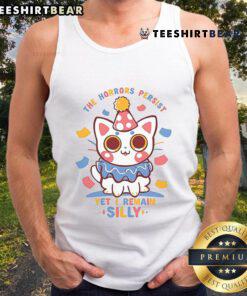 Alt Text: Cute cat wearing a 'The Horrors Persist, Yet I Remain Silly' tank top, showcasing a playful and humorous vibe.