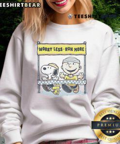 Cute Peanuts Worry Less Run More Sweatshirt featuring playful Snoopy and friends in vibrant colors.