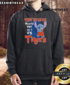 Alt Text: Cute Stitch Detroit Tigers hoodie with 'They Hate Us Because They Ain't Us' slogan, perfect for fans.