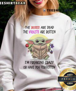 Alt Text: Funny Baby Yoda sweatshirt with roses are dead, violets are rotten quote, perfect for Star Wars fans and humor lovers.