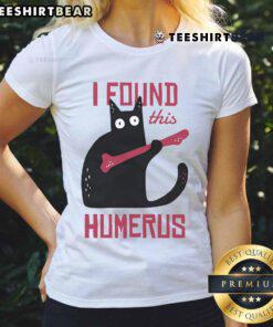 Funny cat wearing a bone-themed outfit on a ladies tee, showcasing humor and charm in a playful pose.