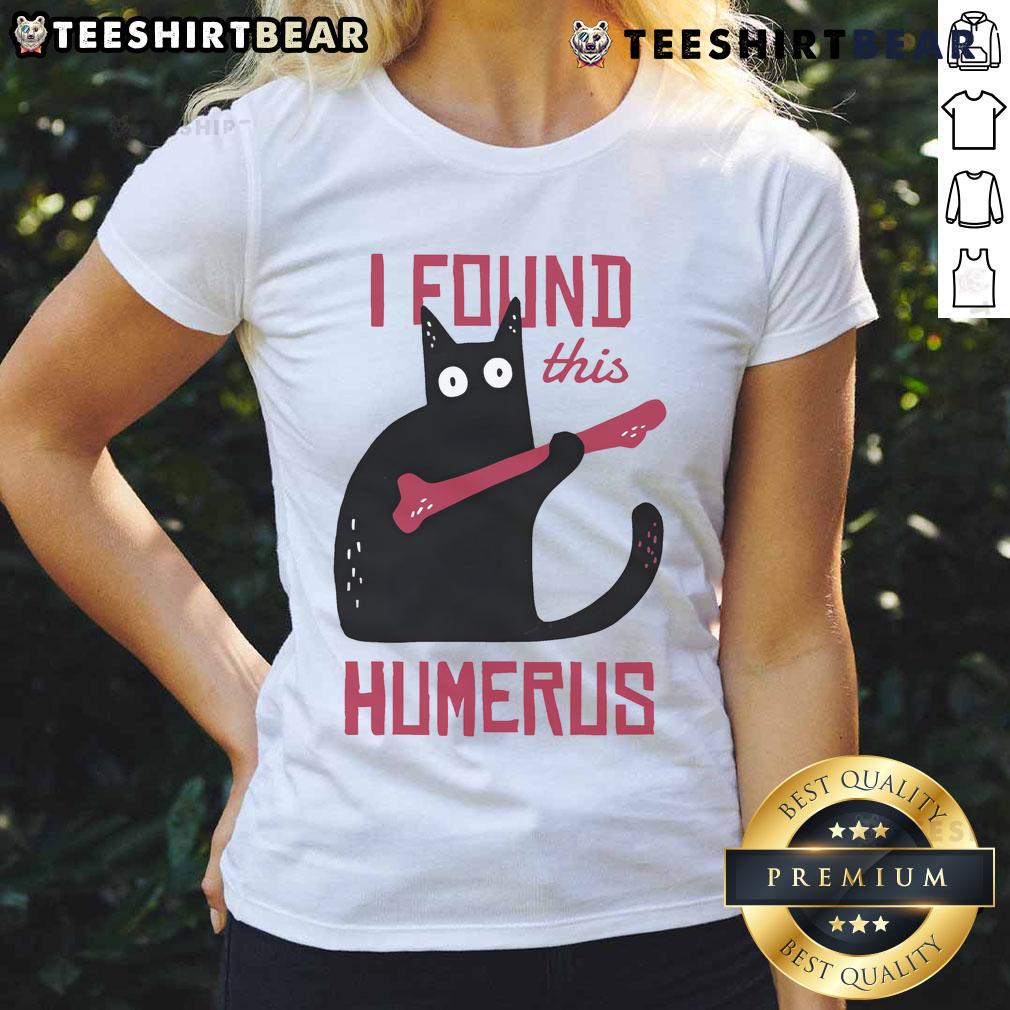 Funny cat wearing a bone-themed outfit on a ladies tee, showcasing humor and charm in a playful pose.