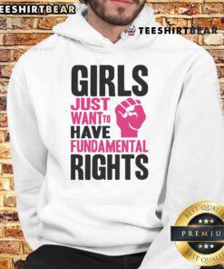 Funny girl wearing 'Just Want To Have Fundamental Rights' protest hoodie at a lively demonstration for equality.