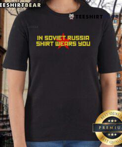 Funny 'In Soviet Russia, Shirt Wears You' Ladies Tee displayed on a model, showcasing humor and unique style.
