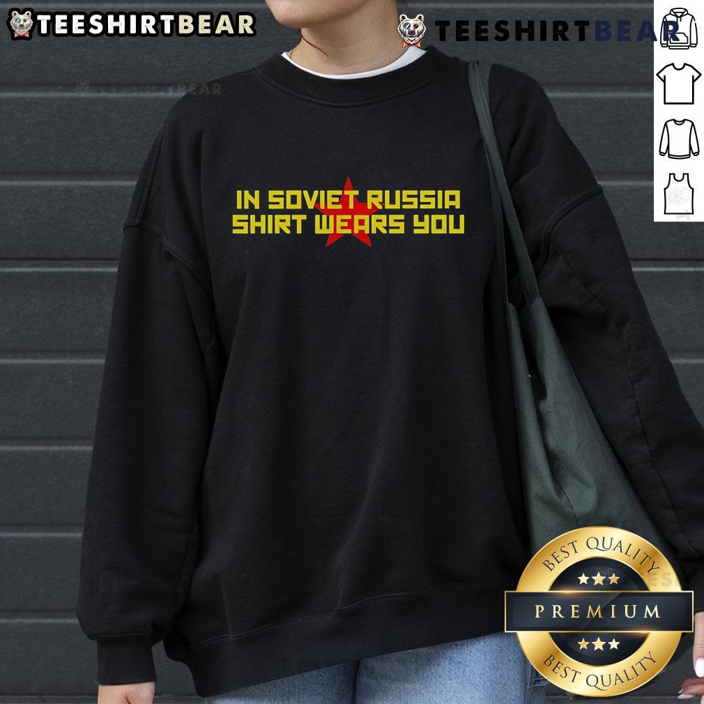 Funny Soviet Russia sweatshirt featuring 'In Soviet Russia, shirt wears you' humorous graphic design.