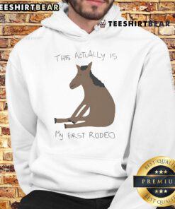Funny 'This Actually Is My First Rodeo' horse hoodie featuring vibrant graphics for rodeo fans and casual wear.