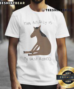 Funny 'This Actually Is My First Rodeo' horse t-shirt design featuring a playful graphic for rodeo enthusiasts.