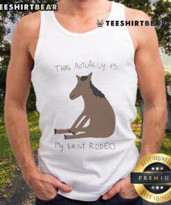 Funny 'This Actually Is My First Rodeo' horse tank top on display, perfect for rodeo fans and casual wear.