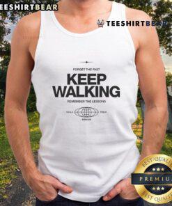 Calum Von Moger wearing a Koala Freak Globe tank top with 'Forget The Past, Keep Walking, Remember The Lessons' slogan.