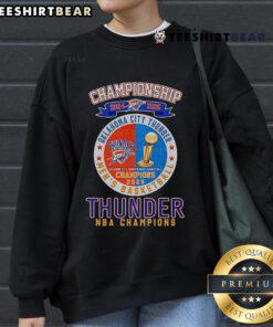 Alt Text: Oklahoma City Thunder NBA Champions sweatshirt for the 2024-2025 season, featuring team logo and vibrant design.