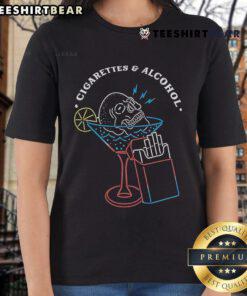 Stylish ladies tee featuring a skull design with cigarettes and alcohol, perfect for edgy fashion lovers.