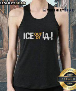 Protester wearing an 'Anti-ICE' tank top at a Los Angeles immigration protest against ICE policies in the USA.