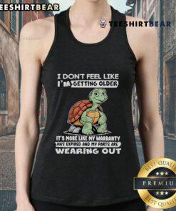 Funny tank top featuring a turtle and the phrase about aging and expired warranty, perfect for humor lovers.