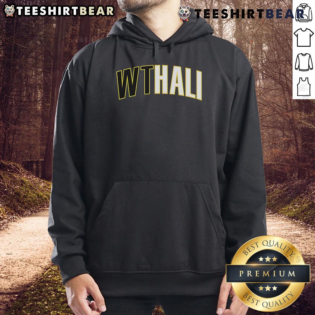 Tyrese Haliburton wearing a stylish Indiana Pacers hoodie with Wthali text, showcasing team spirit and fashion.