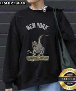 Official New York Yankees Tiny Turnip Velociraptor Sweatshirt featuring a playful dinosaur design and team colors.