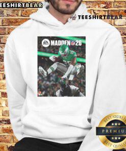 Saquon Barkley hurdles a defender on the cover of Madden NFL, featured on a stylish Philadelphia Eagles hoodie.