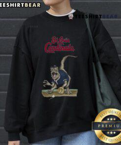 Official St. Louis Cardinals Tiny Turnip Velociraptor Sweatshirt in red, featuring a playful dinosaur design for fans.