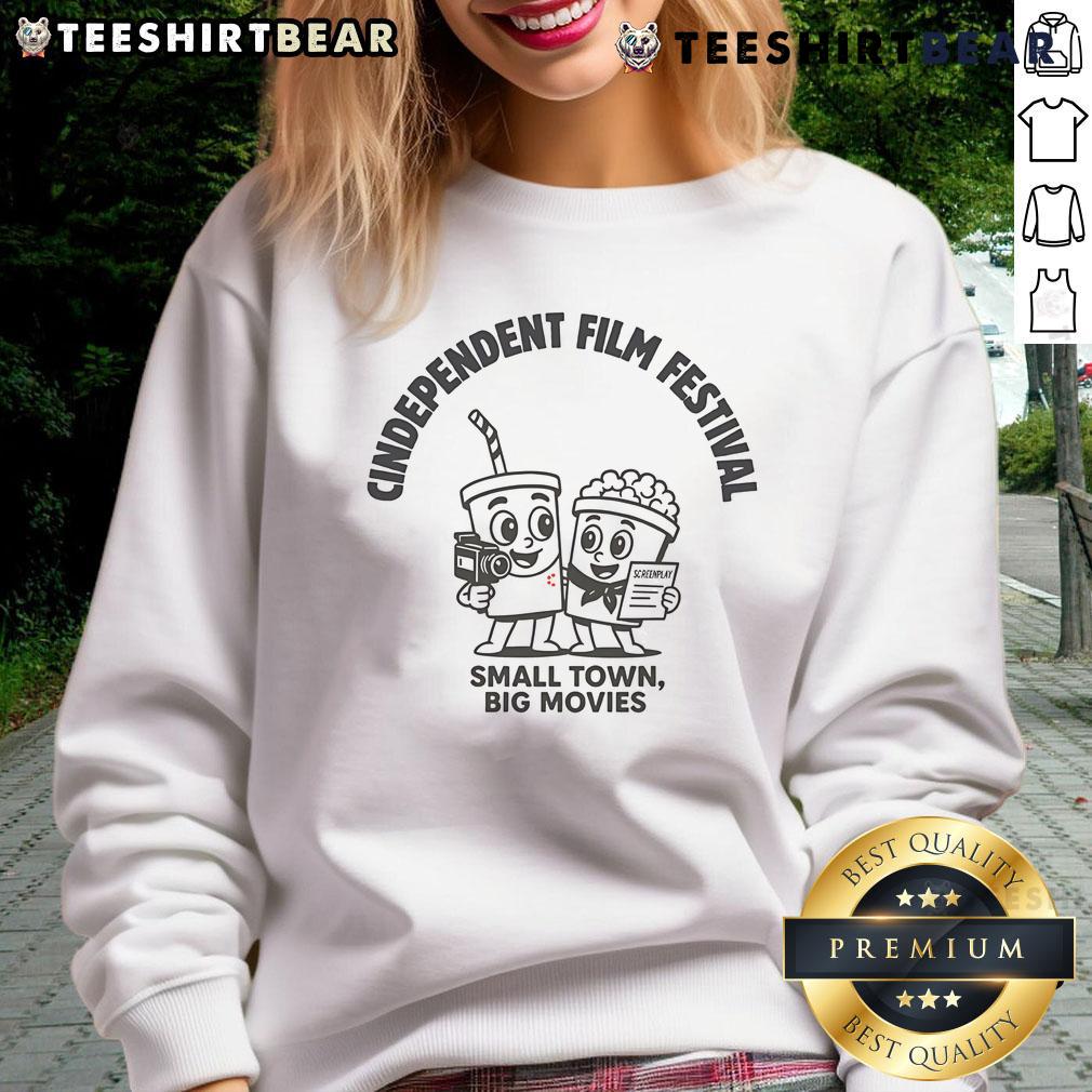 Alt Text: Cozy 'Pretty Independent Small Town Big Movies' sweatshirt showcasing a stylish design perfect for movie lovers.