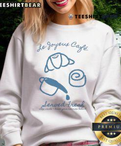 Cozy sweatshirt featuring 'Pretty Le Joyeux Caf' design, perfect for embracing comfort and style while sipping coffee.