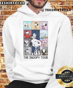 Alt Text: Cozy black hoodie featuring Snoopy, perfect for fans of The Snoopy Tour and Taylor's Eras Tour merchandise.