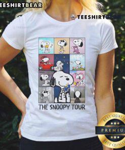 The Snoopy Tour Taylor Eras Tour Ladies Tee featuring vibrant graphics and a stylish design for fans.