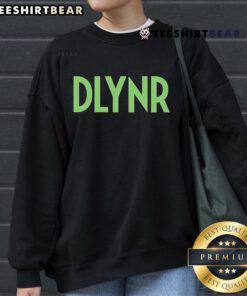 Alt Text: Top DLYNR Box Dolly Noire Sweatshirt featuring trendy design and comfortable fit for casual streetwear style.