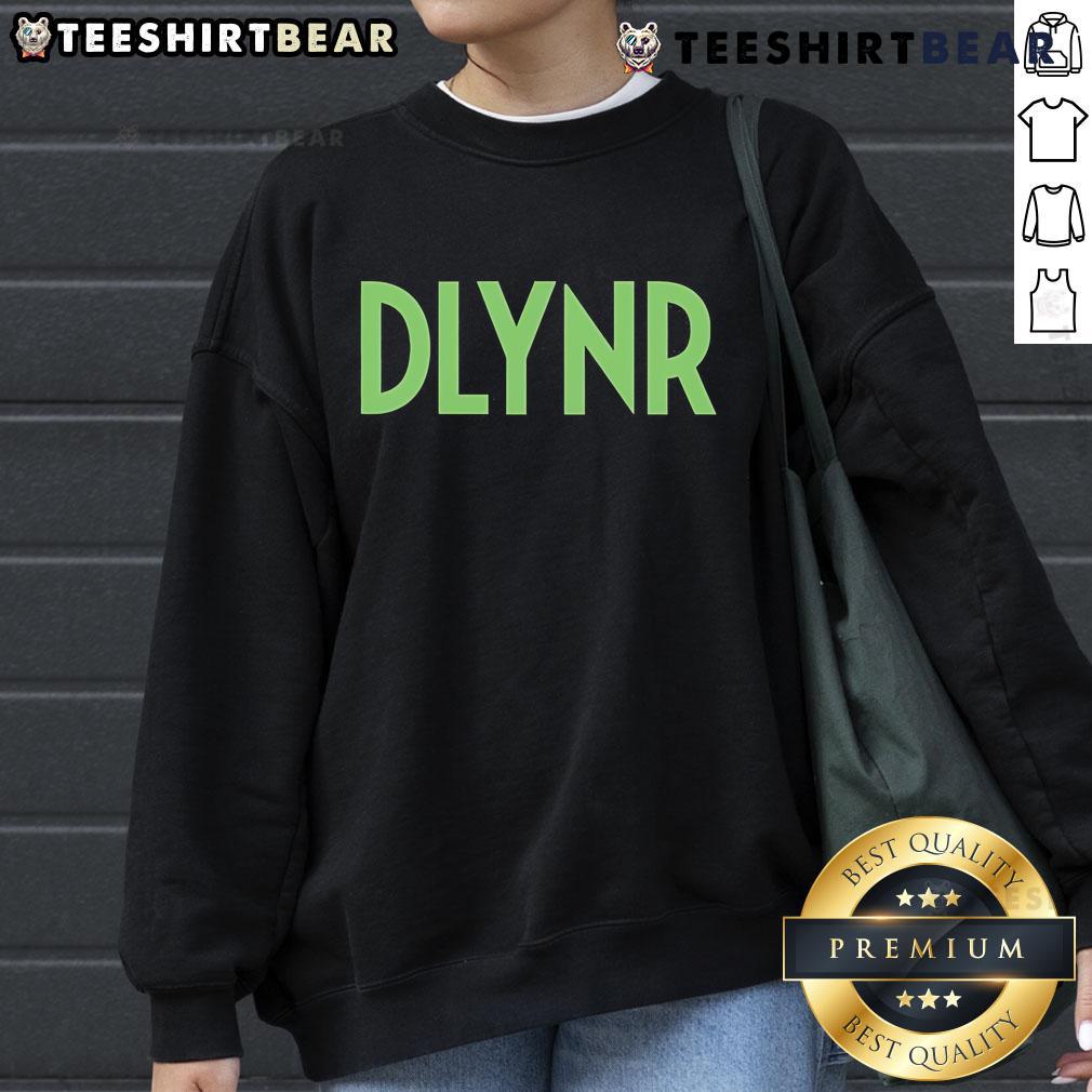 Alt Text: Top DLYNR Box Dolly Noire Sweatshirt featuring trendy design and comfortable fit for casual streetwear style.