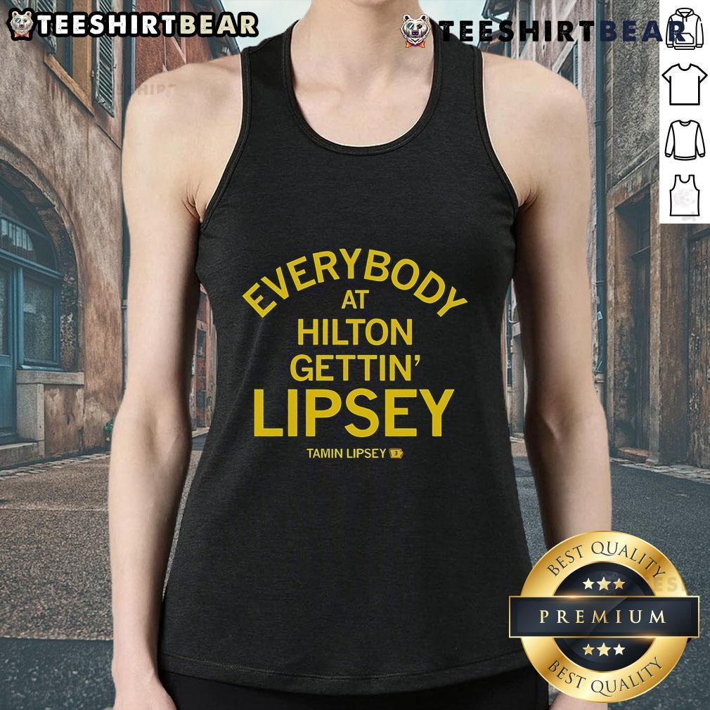 Top Everybody at Hilton wearing Lipsey tank top, showcasing summer fashion style and vibrant colors at the event.