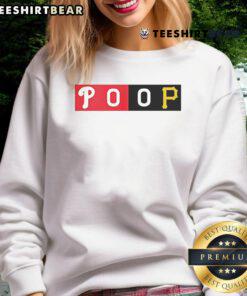 Top fans proudly wearing the commemorative Phillies Pirates POOP sweatshirt at a lively baseball game.