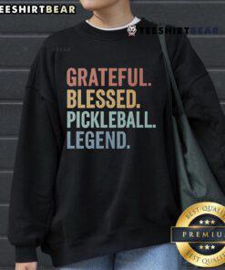 Cozy 'Top Grateful Blessed Pickleball Legend' sweatshirt in vibrant colors, perfect for pickleball enthusiasts and fans.