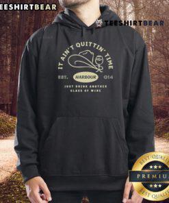 Alt Text: Cozy hoodie featuring the phrase It Ain't Quittin' Time, Just Drink Another Glass of Wine for wine lovers.